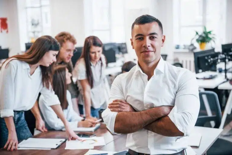 A confident young professional receiving emerging leader acceleration coaching to fast-track performance.