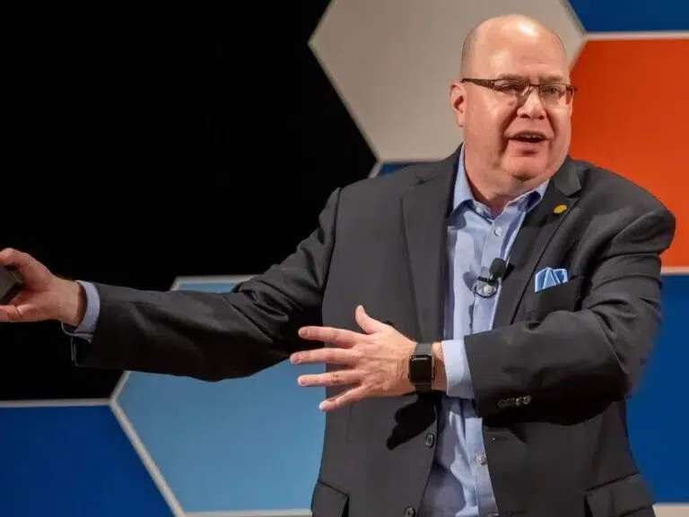 Kevin Sensenig explaining the Epoxy Theory and team momentum during a "Good Leadership is a Team Sport" session.